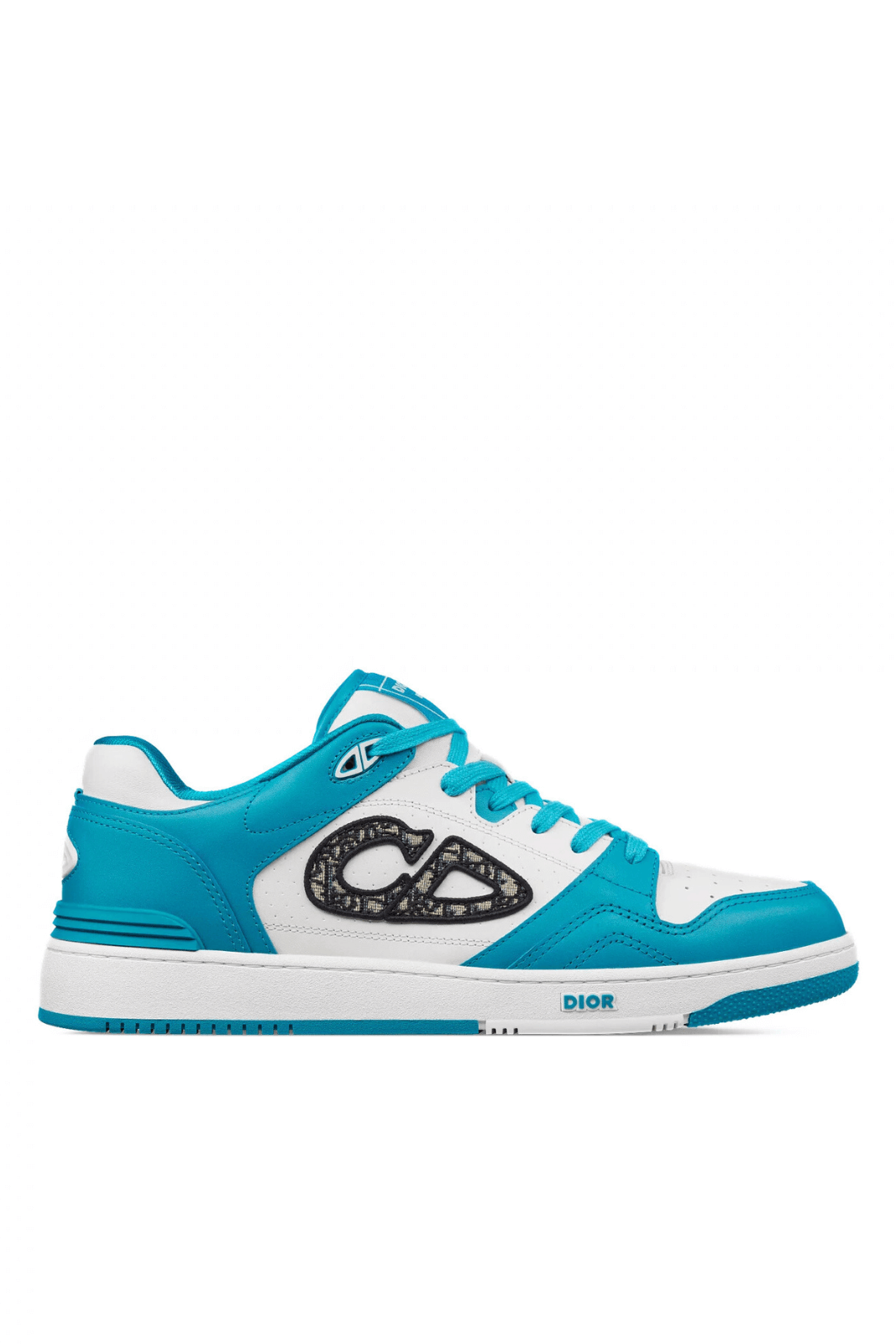 A Dior B57 low-top sneaker in blue and white, featuring the Dior Oblique logo and a rubber sole.