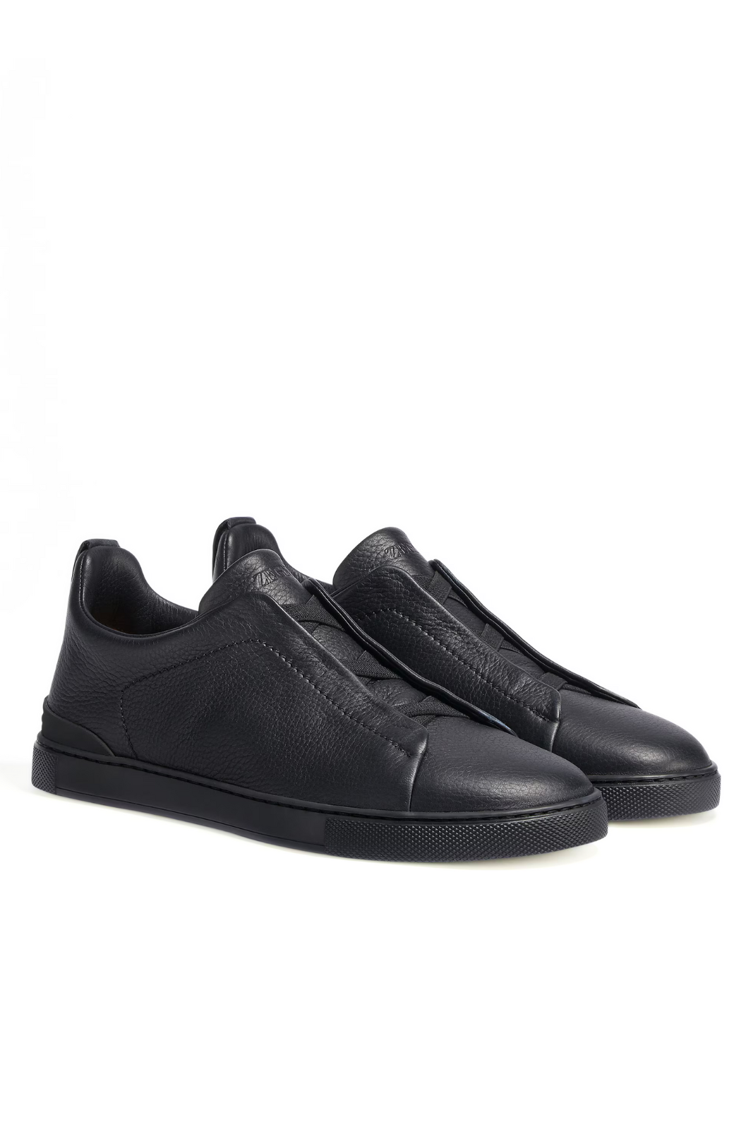 Zegna black leather sneakers on a white background
