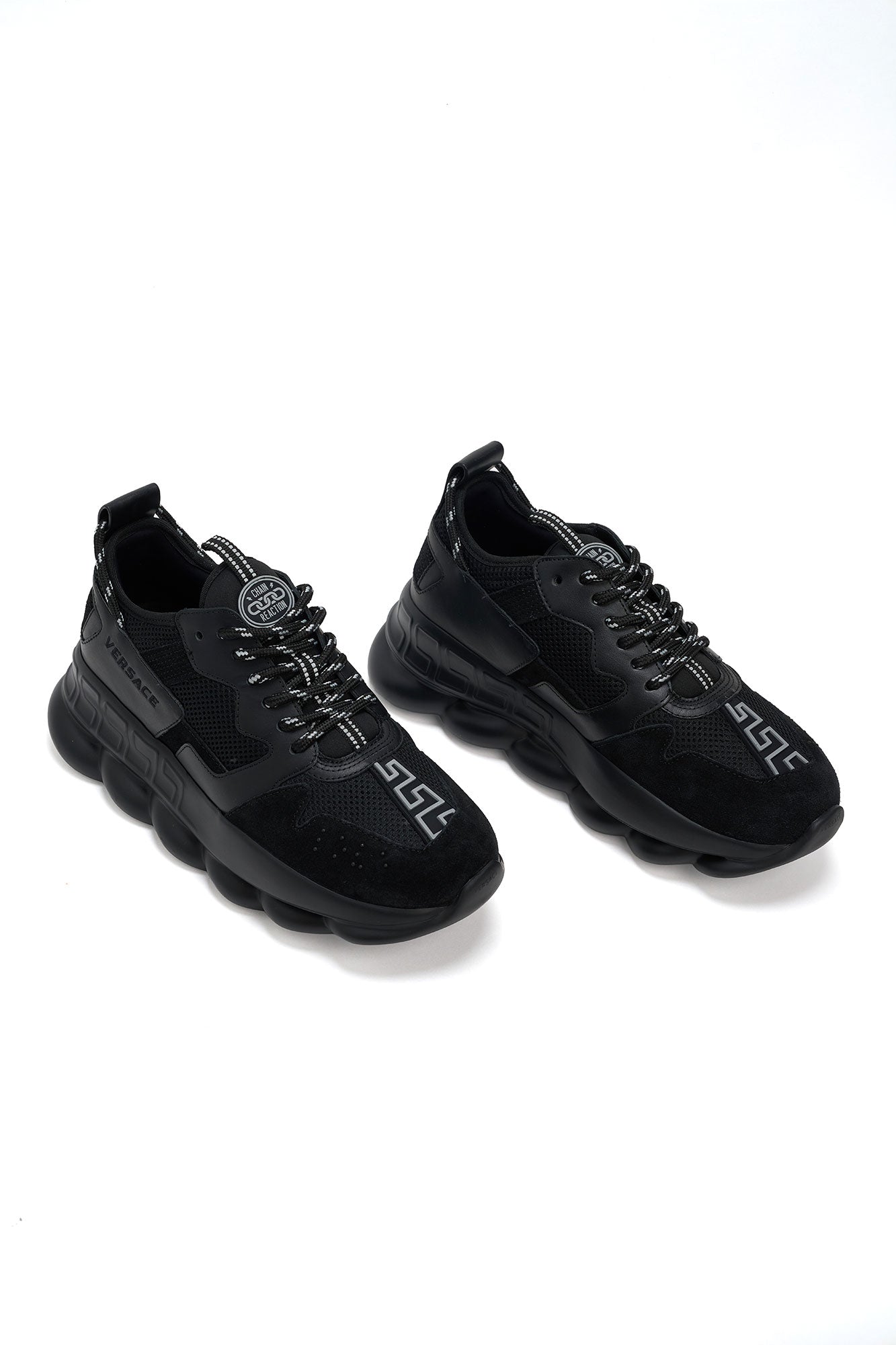 versace Black sneakers with brand logo on a white background