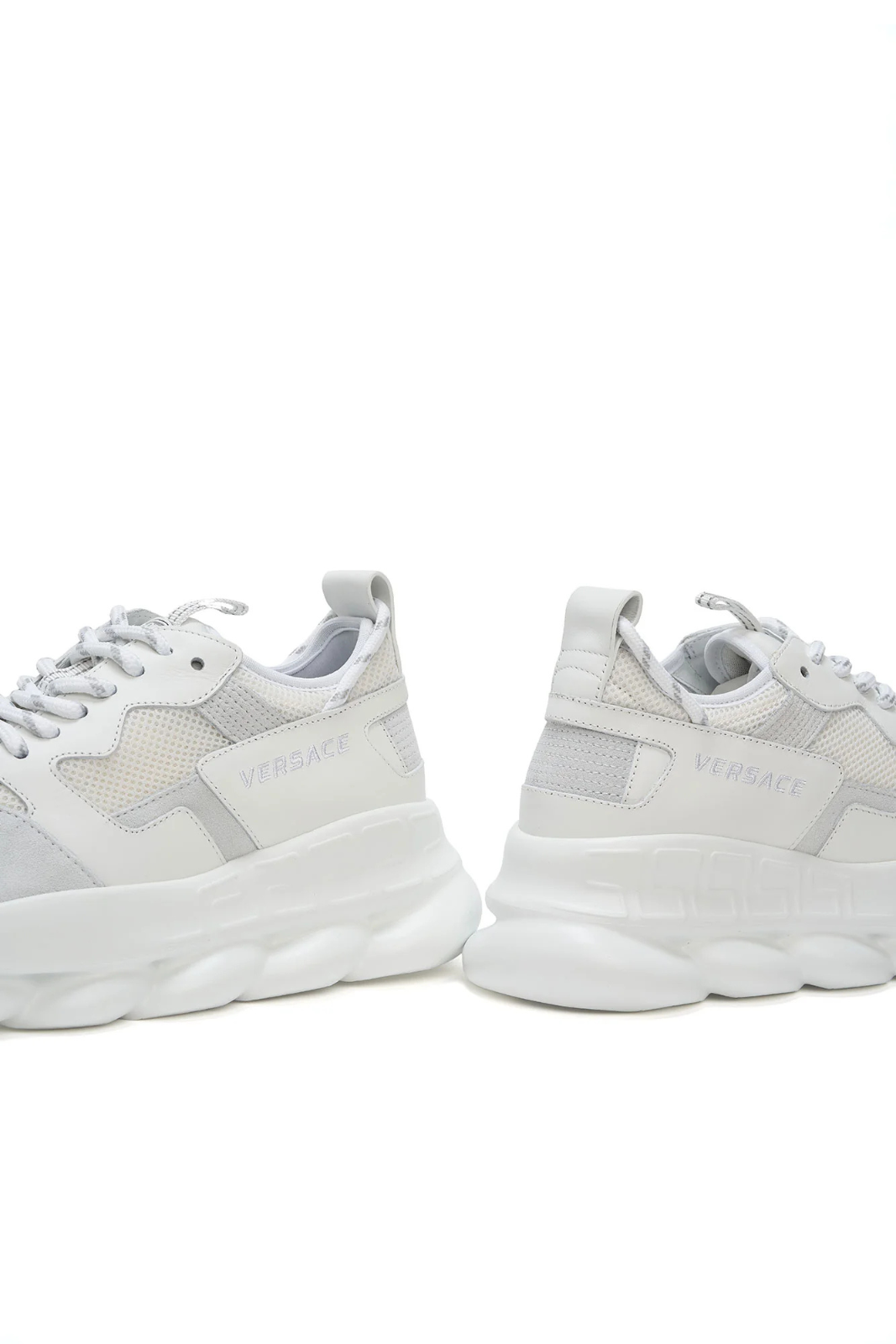 versace White sneakers with gray accents on a white background