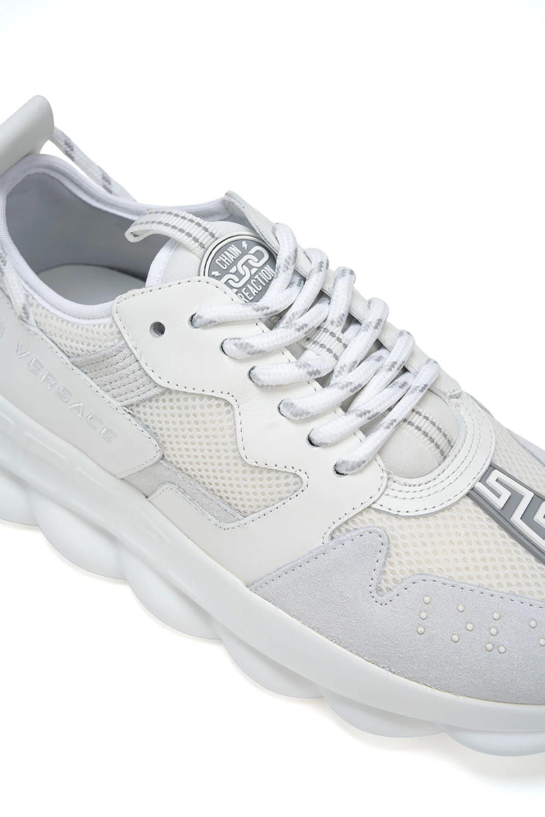 versace White sneaker with gray accents on a white background