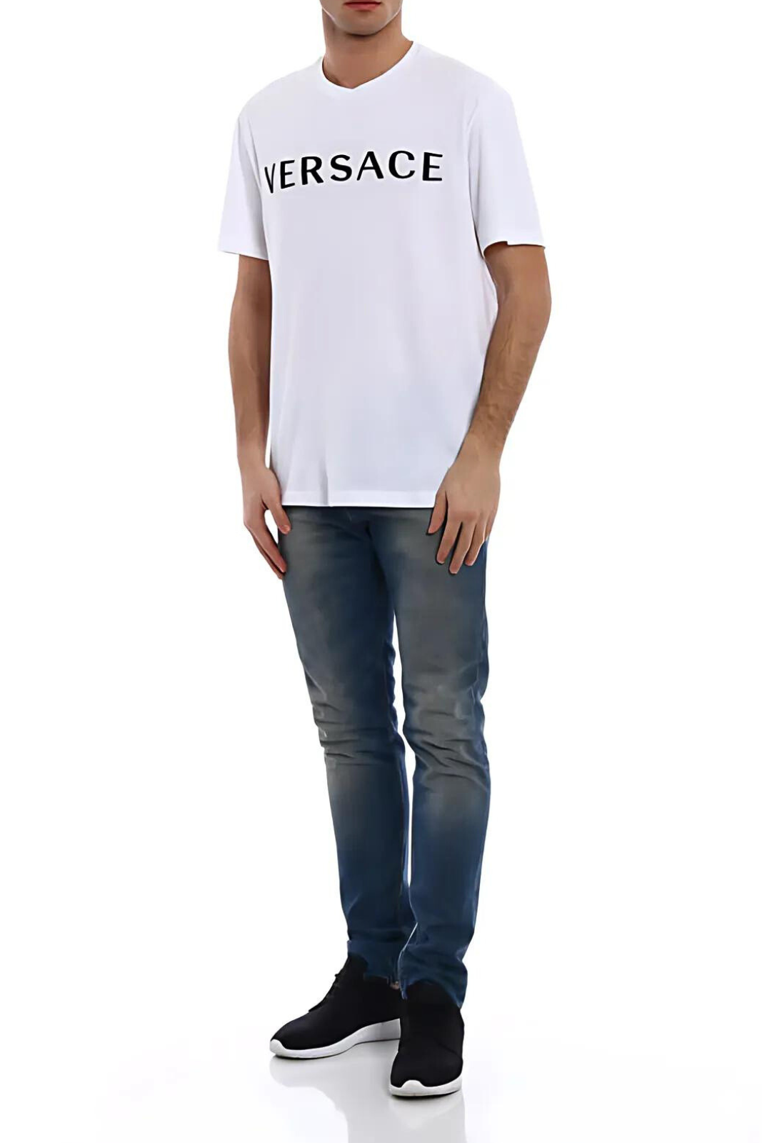 A white Versace t-shirt with contrasting logo embroidery on the chest.