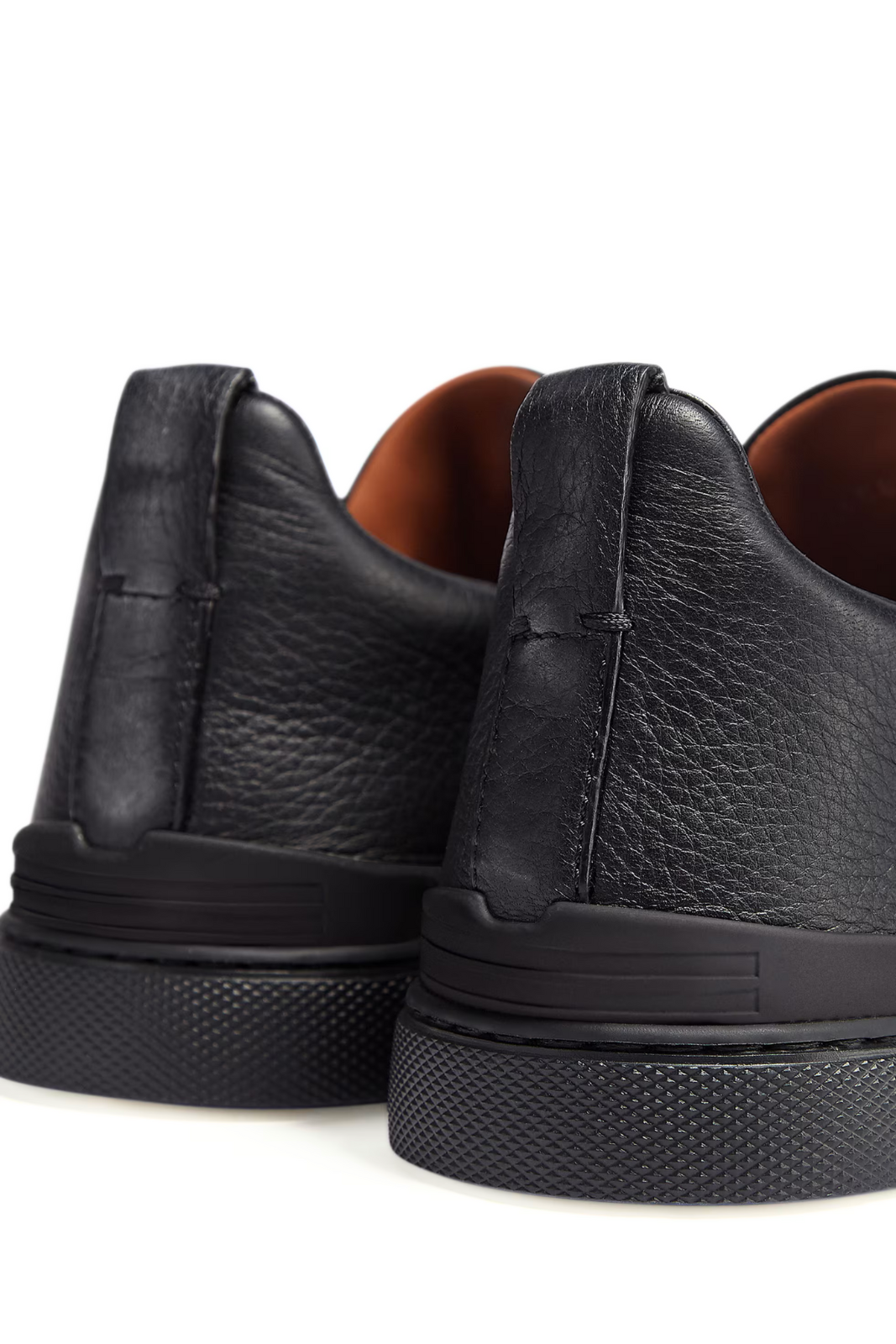 Zegna Black leather shoes with brown lining on a white background